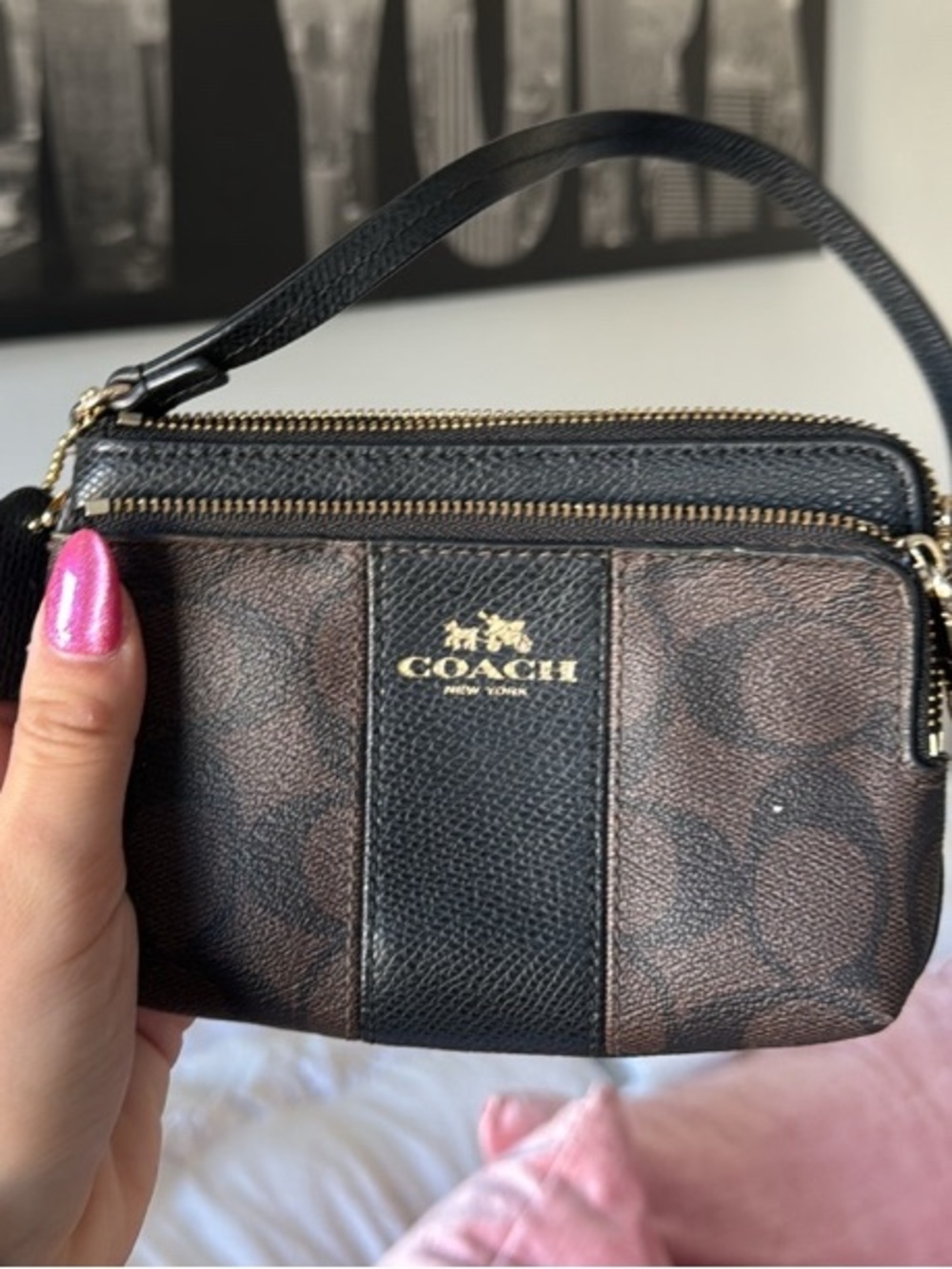 COACH Brown & Black Double Zip Signature Wristlet with Gold Logo.